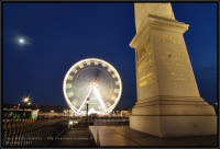 Grande Roue illuminée devant l'obelisque